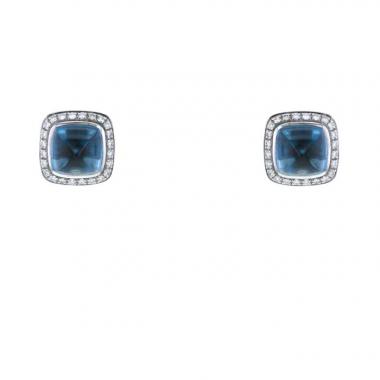Paire de clous d'oreilles Fred Pain de Sucre en or blanc,  diamants et topaze bleue
