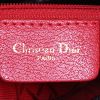 Dior Lady Dior medium model bag worn on the shoulder or carried in the hand in black - Detail D4 thumbnail