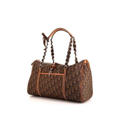 Dior Romantique bag worn on the shoulder or carried in the hand in brown monogram canvas and brown leather