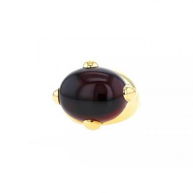 Bague époque années 80 Pomellato en or jaune et grenat