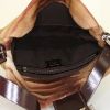 Fendi Baguette bag worn on the shoulder or carried in the hand in brown foal and brown - Detail D2 thumbnail