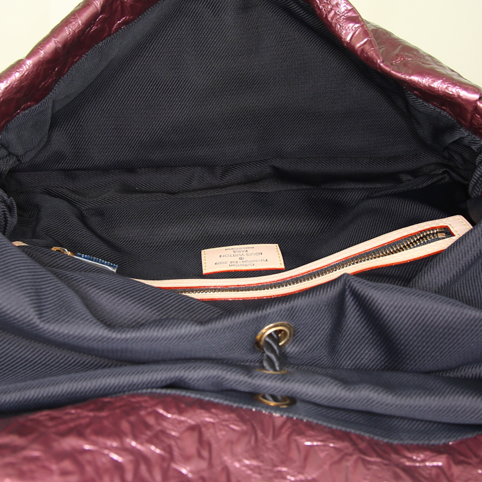 Pochette Louis Vuitton African Queen en cuir monogram empreinte mordoré - Detail D2