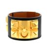Bracelet manchette Hermes Médor en métal doré et cuir noir - 00pp thumbnail