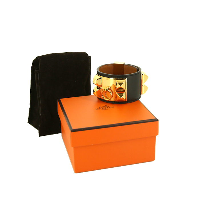 Bracelet manchette Hermes Médor en métal doré et cuir noir