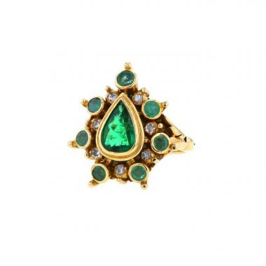 Bague époque années 50 Rene Boivin en or jaune,  émeraudes et diamants