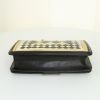 Chanel Boy shoulder bag in black, cream color and gold leather - Detail D5 thumbnail