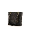 Chanel Shopping GST small model bag worn on the shoulder or carried in the hand in black quilted grained leather - 00pp thumbnail