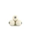 Chanel, lot de quatre balles de tennis avec leur étui en toile enduite - 00pp thumbnail