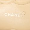 Chanel Timeless Classic bag worn on the shoulder or carried in the hand in beige quilted leather - Detail D4 thumbnail