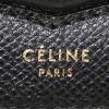 Céline Trotteur small model shoulder bag in black grained leather - Detail D3 thumbnail