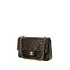 Chanel Timeless Classic bag worn on the shoulder or carried in the hand in black quilted leather - 00pp thumbnail
