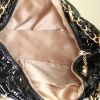 Chanel Petit Shopping handbag in black patent leather - Detail D2 thumbnail