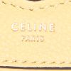Céline Trotteur small model shoulder bag in yellow grained leather - Detail D3 thumbnail