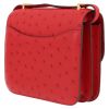 Hermes Constance mini shoulder bag in red Vif ostrich leather - Detail D5 thumbnail