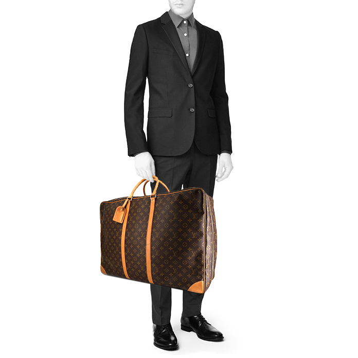 Bolso Louis Vuitton Sirius 65 en lona Monogram y cuero natural - Detail D1