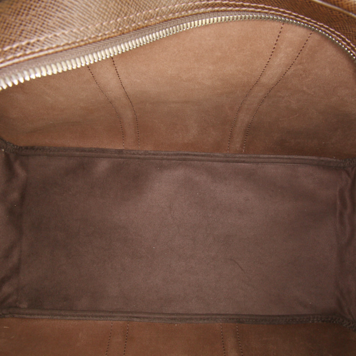 Louis Vuitton Kendall travel bag in brown taiga leather - Detail D3