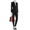 Cartier Marcello bag worn on the shoulder or carried in the hand in burgundy patent leather and burgundy leather - Detail D1 thumbnail