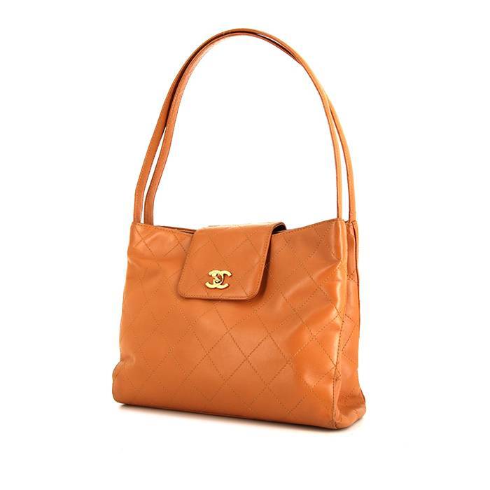 Chanel handbag in orange quilted leather