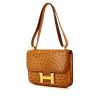 Hermes Constance bag worn on the shoulder or carried in the hand in gold ostrich leather - 00pp thumbnail