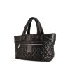 Chanel Coco Cocoon bag worn on the shoulder or carried in the hand in black quilted leather - 00pp thumbnail