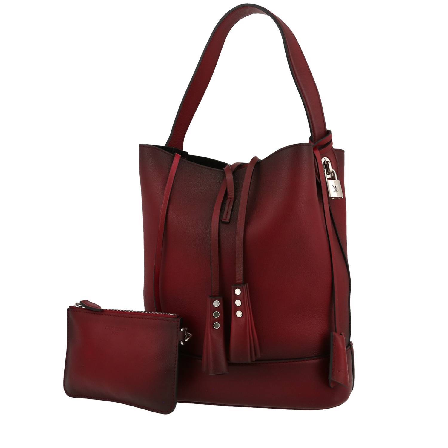 Louis Vuitton Idole handbag in burgundy shading leather
