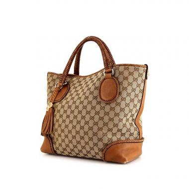 Sac à main Gucci Marrakech en toile monogram marron et cuir marron