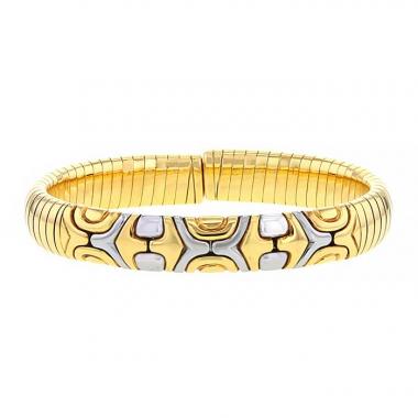 Hald-rigid Bulgari Alveare bracelet in yellow gold and stainless steel