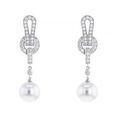 Paire de boucles d'oreilles Cartier Agrafe en or blanc,  diamants et perles de culture
