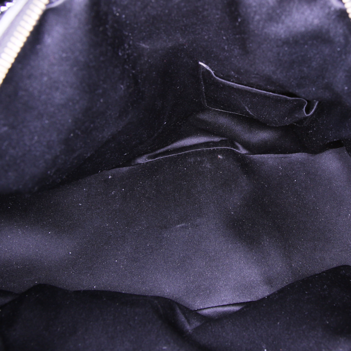 Bolso de mano Yves Saint Laurent Muse modelo grande en charol negro - Detail D2