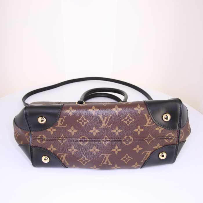 Louis Vuitton Phenix medium model handbag in brown monogram canvas and black leather - Detail D5