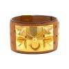 Hermes Médor cuff bracelet in gold plated and leather - 00pp thumbnail