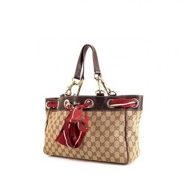 Bolso Cabás Gucci Positano en lona Monogram beige y cuero marrón