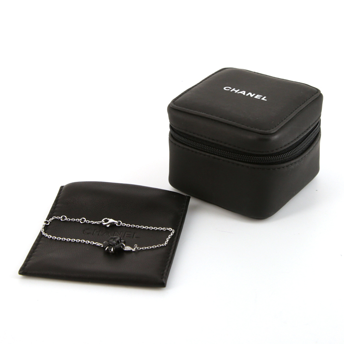 Chanel Camelia bracelet in white gold,  onyx and diamonds