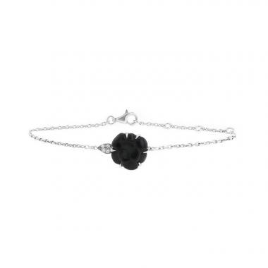 Bracelet Chanel Camelia en or blanc,  onyx et diamants