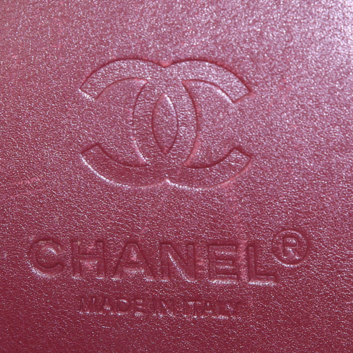 Chanel Coco Cocoon bag worn on the shoulder or carried in the hand in black quilted canvas and black leather - Detail D3