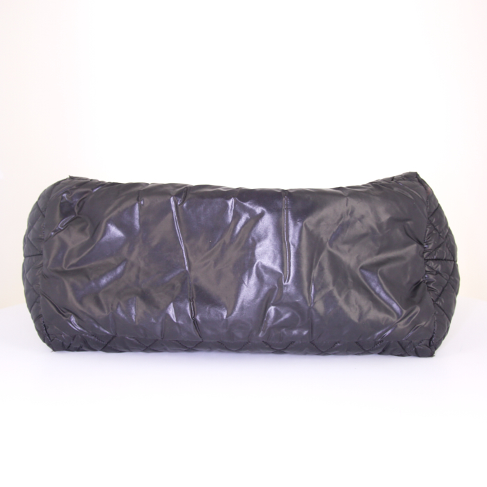 Chanel Coco Cocoon bag worn on the shoulder or carried in the hand in black quilted canvas and black leather - Detail D4