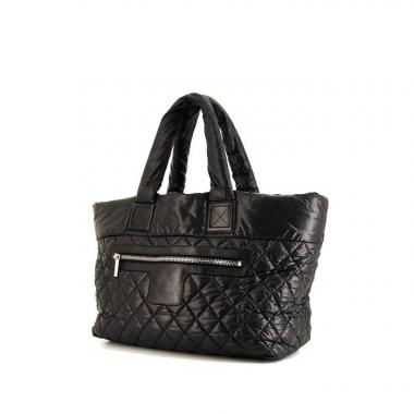 Bolso para llevar al hombro o en la mano Chanel Coco Cocoon en lona acolchada negra y cuero negro