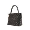 Sac à main Chanel Medaillon - Bag en cuir grainé matelassé noir - 00pp thumbnail