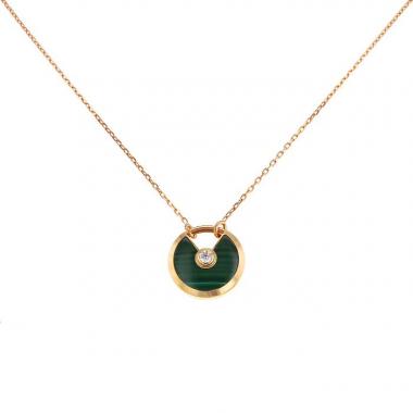 Collier Cartier Amulette petit modèle en or rose,  malachite et diamant