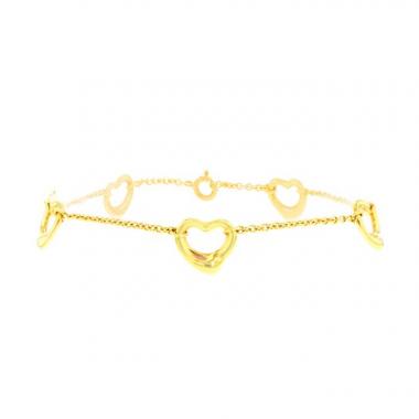 Tiffany 
Co Open Heart bracelet in yellow gold