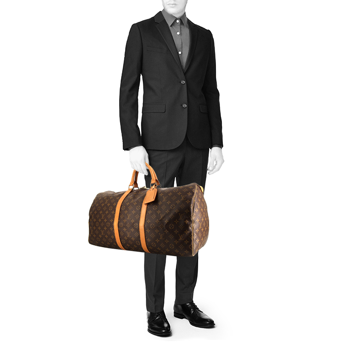 Sac de voyage Louis Vuitton Keepall 55 cm en toile monogram marron et cuir naturel - Detail D1