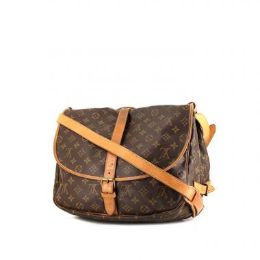 Sac bandoulière Louis Vuitton Saumur grand modèle en toile monogram enduite marron et cuir naturel
