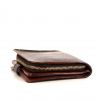 Louis Vuitton wallet in monogram canvas and brown leather - Detail D4 thumbnail