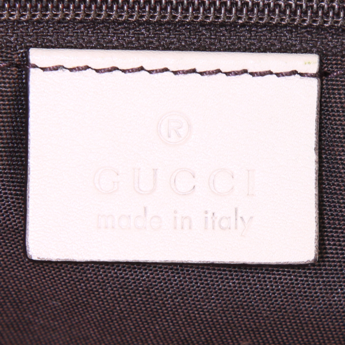 Gucci Britt bag worn on the shoulder or carried in the hand in brown monogram canvas and beige leather - Detail D3