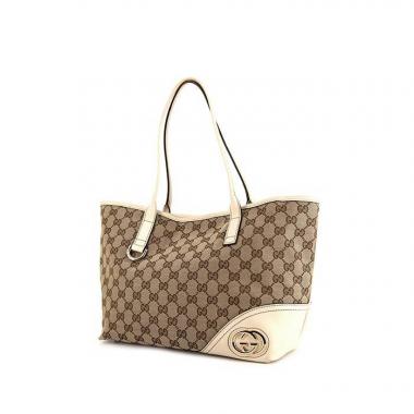 Bolso para llevar al hombro o en la mano Gucci Britt en lona Monogram marrón y cuero beige