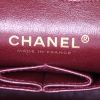 Chanel Timeless handbag in black and beige quilted leather - Detail D4 thumbnail