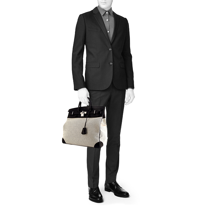 Hermes Haut à Courroies - Travel Bag travel bag in beige and black bicolor canvas and black leather - Detail D1