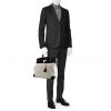 Bolsa de viaje Hermes Haut à Courroies - Travel Bag en lona bicolor beige y negra y cuero negro - Detail D1 thumbnail