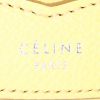 Céline Trotteur small model shoulder bag in yellow grained leather - Detail D3 thumbnail