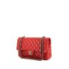 Chanel Timeless Classic bag worn on the shoulder or carried in the hand in red quilted leather - 00pp thumbnail